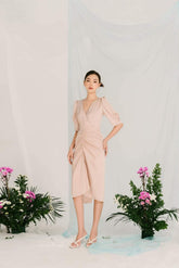 Silk midi wrap dress with V-neckline and ruched waist detail for a flattering silhouette